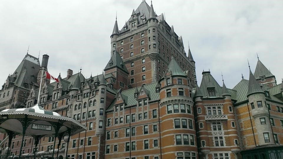 Quebec City's illustrious Chateau Frontenac comes into view as the morning fog fades